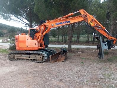 TRABAJO DE MAQUINISTA DE RETROEXCAVADORA