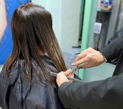 PELUQUERA/O